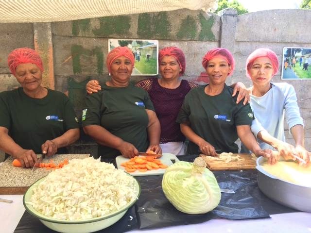 Community kitchen team preparing food
