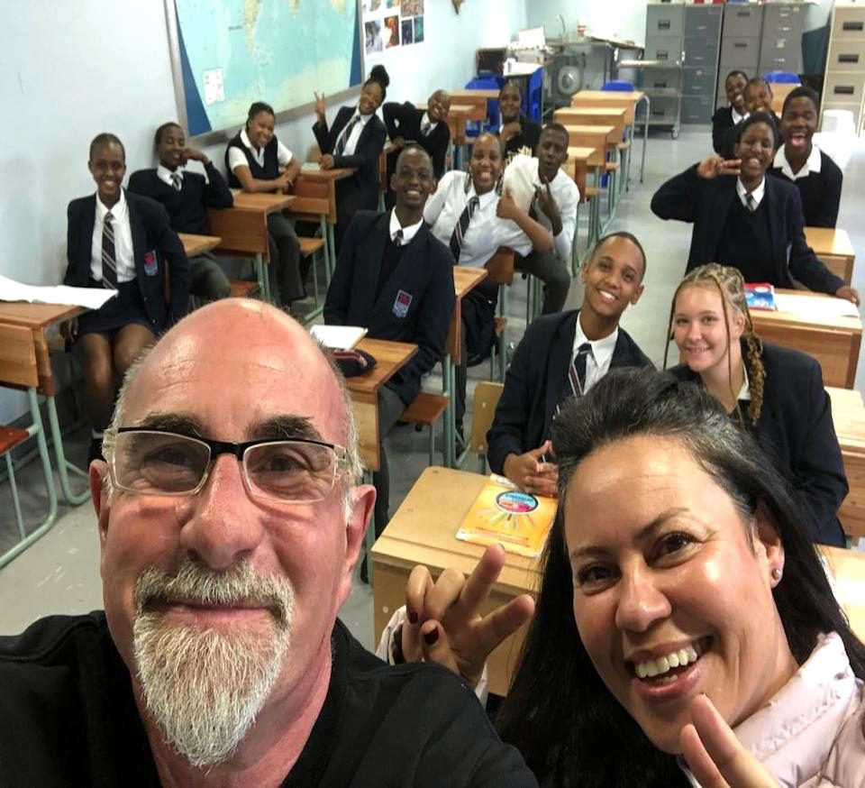 Caban leadership visiting a school classroom